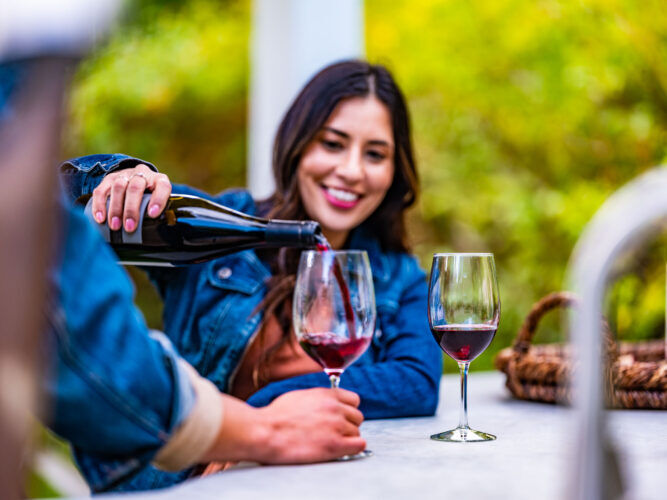 woman pouring wine