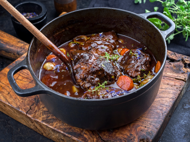 pot roast in a dutch oven with vegetables