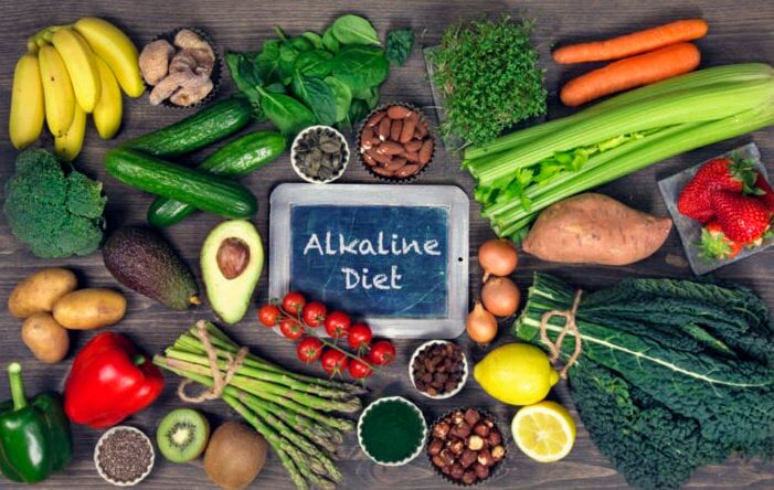 Alkaline foods above the wooden background