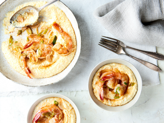 Shrimp with creamy grits in bowls