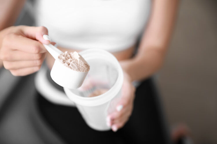 Woman with powdered supplement